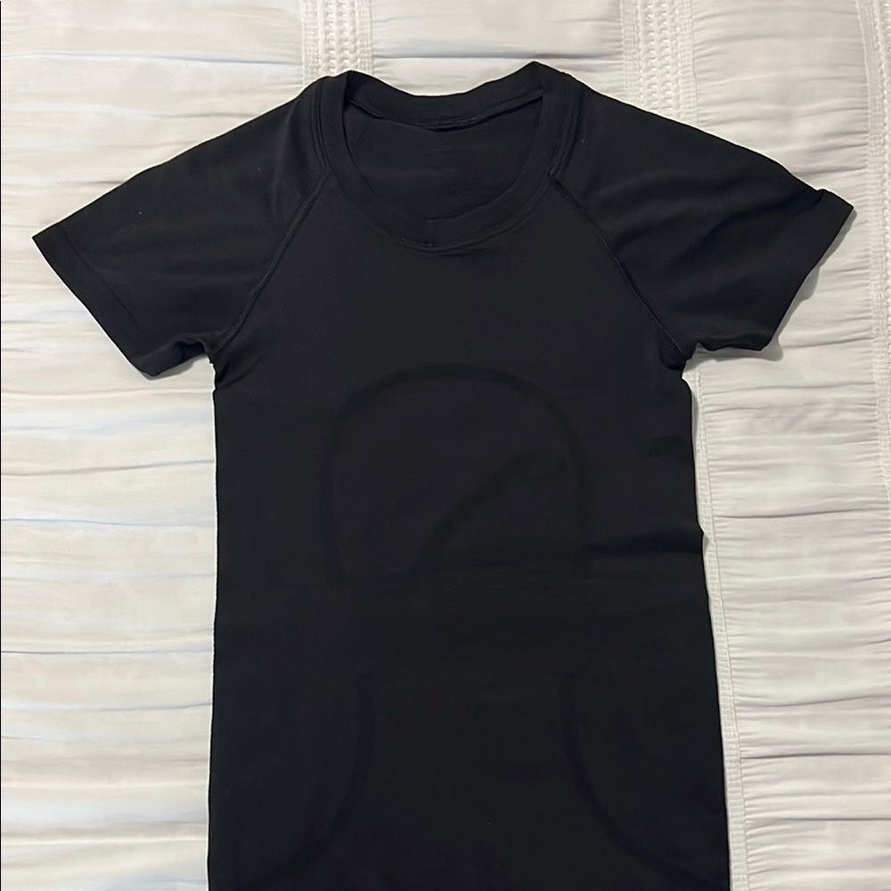 black lululemon swiftly 2.0 hip length